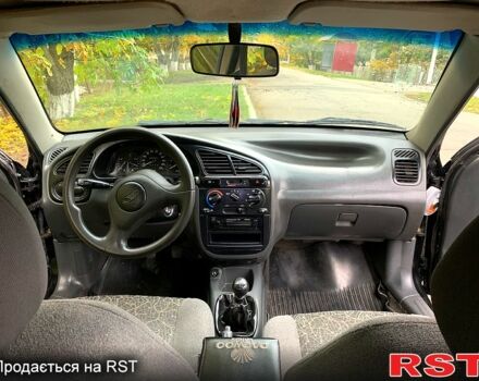 Черный Дэу Ланос, объемом двигателя 1.5 л и пробегом 256 тыс. км за 2600 $, фото 10 на Automoto.ua