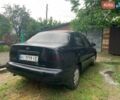 Чорний Деу Ланос, об'ємом двигуна 1.5 л та пробігом 200 тис. км за 2600 $, фото 1 на Automoto.ua
