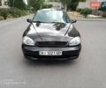 Черный Дэу Ланос, объемом двигателя 1.5 л и пробегом 200 тыс. км за 1999 $, фото 3 на Automoto.ua