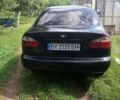Черный Дэу Ланос, объемом двигателя 1.5 л и пробегом 130 тыс. км за 2200 $, фото 3 на Automoto.ua