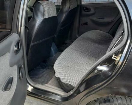 Чорний Деу Ланос, об'ємом двигуна 1.5 л та пробігом 371 тис. км за 2100 $, фото 2 на Automoto.ua