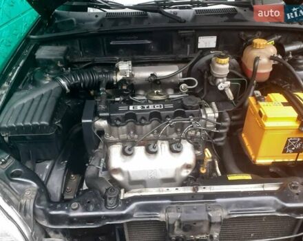 Черный Дэу Ланос, объемом двигателя 1.5 л и пробегом 94 тыс. км за 2800 $, фото 2 на Automoto.ua