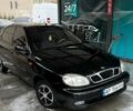 Черный Дэу Ланос, объемом двигателя 1.5 л и пробегом 200 тыс. км за 1900 $, фото 1 на Automoto.ua