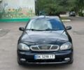 Черный Дэу Ланос, объемом двигателя 1.5 л и пробегом 150 тыс. км за 2200 $, фото 1 на Automoto.ua