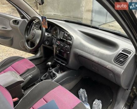 Чорний Деу Ланос, об'ємом двигуна 1.5 л та пробігом 222 тис. км за 1800 $, фото 22 на Automoto.ua