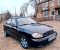 Чорний Деу Ланос, об'ємом двигуна 1.5 л та пробігом 260 тис. км за 1899 $, фото 1 на Automoto.ua