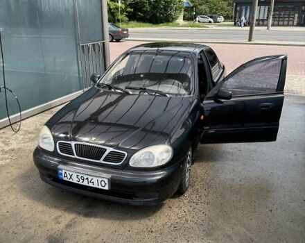 Черный Дэу Ланос, объемом двигателя 1.5 л и пробегом 240 тыс. км за 2100 $, фото 1 на Automoto.ua