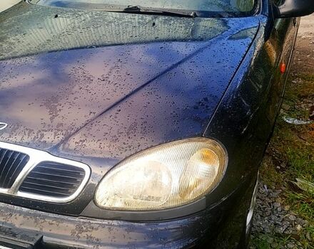 Черный Дэу Ланос, объемом двигателя 1.5 л и пробегом 230 тыс. км за 1000 $, фото 2 на Automoto.ua