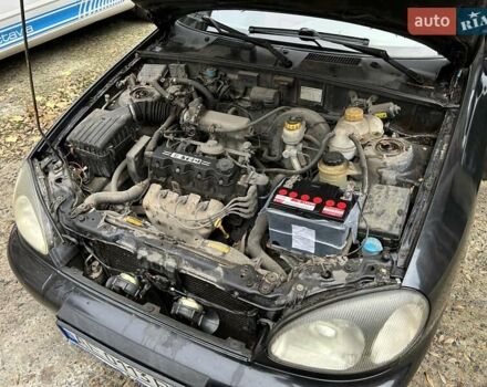 Чорний Деу Ланос, об'ємом двигуна 1.5 л та пробігом 222 тис. км за 1800 $, фото 20 на Automoto.ua