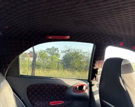 Деу Ланос 2006 у Новомосковске на Automoto.ua Чорний Деу Ланос, об'ємом двигуна 1.5 л та пробігом 328 тис. км за 1800 $, фото 10 на Automoto.ua