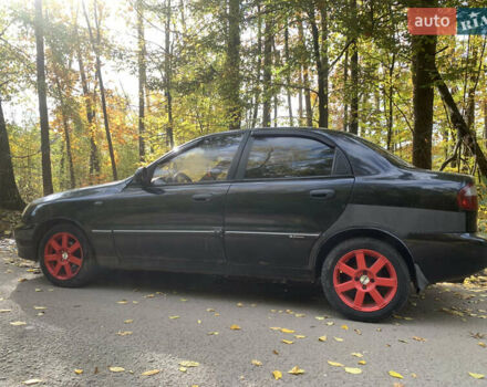 Черный Дэу Ланос, объемом двигателя 1.5 л и пробегом 290 тыс. км за 1600 $, фото 1 на Automoto.ua