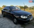 Черный Дэу Ланос, объемом двигателя 1.5 л и пробегом 328 тыс. км за 2300 $, фото 3 на Automoto.ua