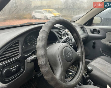 Черный Дэу Ланос, объемом двигателя 1.5 л и пробегом 296 тыс. км за 1000 $, фото 9 на Automoto.ua