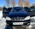 Чорний Деу Ланос, об'ємом двигуна 1.5 л та пробігом 312 тис. км за 1340 $, фото 1 на Automoto.ua
