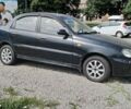 Черный Дэу Ланос, объемом двигателя 1.5 л и пробегом 192 тыс. км за 2100 $, фото 1 на Automoto.ua
