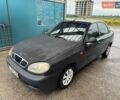 Черный Дэу Ланос, объемом двигателя 1.5 л и пробегом 409 тыс. км за 1500 $, фото 1 на Automoto.ua