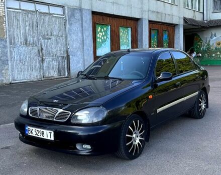 Чорний Деу Ланос, об'ємом двигуна 1.5 л та пробігом 0 тис. км за 2000 $, фото 2 на Automoto.ua