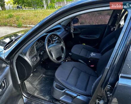 Черный Дэу Ланос, объемом двигателя 1.5 л и пробегом 220 тыс. км за 3100 $, фото 14 на Automoto.ua
