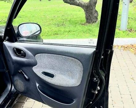 Черный Дэу Ланос, объемом двигателя 1.5 л и пробегом 160 тыс. км за 1800 $, фото 4 на Automoto.ua