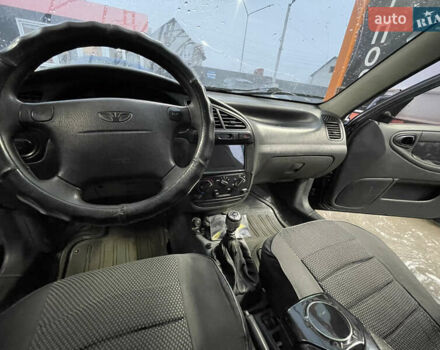 Черный Дэу Ланос, объемом двигателя 1.5 л и пробегом 145 тыс. км за 1799 $, фото 5 на Automoto.ua