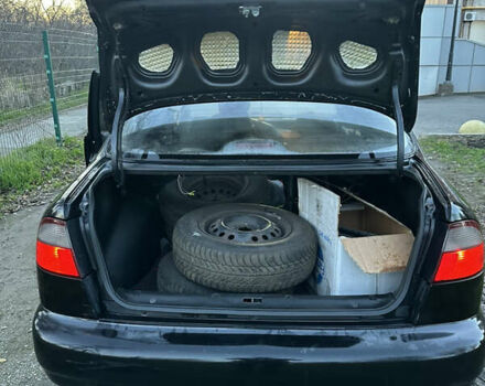 Черный Дэу Ланос, объемом двигателя 1.5 л и пробегом 270 тыс. км за 1900 $, фото 17 на Automoto.ua