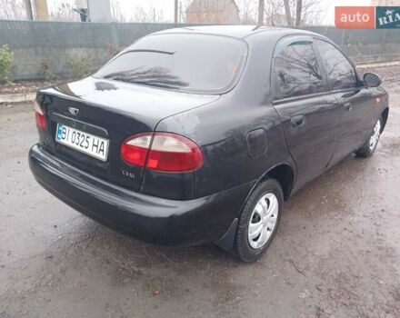 Черный Дэу Ланос, объемом двигателя 1.35 л и пробегом 122 тыс. км за 1699 $, фото 3 на Automoto.ua