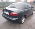 Черный Дэу Ланос, объемом двигателя 1.35 л и пробегом 122 тыс. км за 1699 $, фото 3 на Automoto.ua