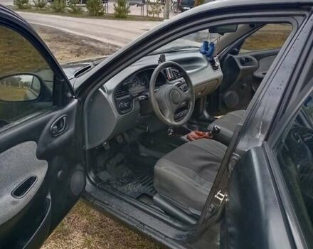 Чорний Деу Ланос, об'ємом двигуна 1.5 л та пробігом 286 тис. км за 2800 $, фото 15 на Automoto.ua