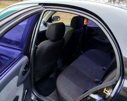 Черный Дэу Ланос, объемом двигателя 1.5 л и пробегом 197 тыс. км за 3150 $, фото 5 на Automoto.ua