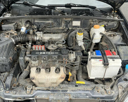 Чорний Деу Ланос, об'ємом двигуна 1.5 л та пробігом 213 тис. км за 1700 $, фото 8 на Automoto.ua