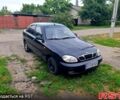 Черный Дэу Ланос, объемом двигателя 1.5 л и пробегом 200 тыс. км за 1400 $, фото 1 на Automoto.ua