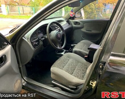 Черный Дэу Ланос, объемом двигателя 1.5 л и пробегом 256 тыс. км за 2600 $, фото 6 на Automoto.ua