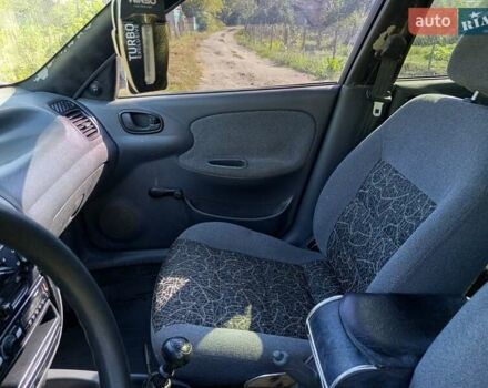 Чорний Деу Ланос, об'ємом двигуна 1.5 л та пробігом 210 тис. км за 1100 $, фото 15 на Automoto.ua