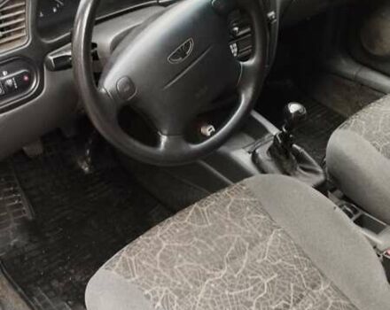 Черный Дэу Ланос, объемом двигателя 1.5 л и пробегом 244 тыс. км за 1650 $, фото 11 на Automoto.ua