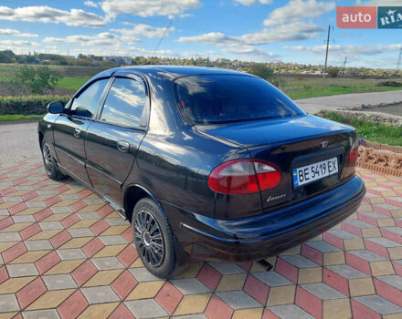 Черный Дэу Ланос, объемом двигателя 1.5 л и пробегом 226 тыс. км за 1450 $, фото 4 на Automoto.ua