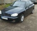 Черный Дэу Ланос, объемом двигателя 1.5 л и пробегом 244 тыс. км за 1650 $, фото 1 на Automoto.ua