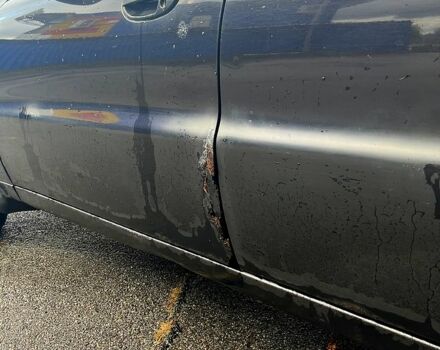 Деу Ланос 2006 у Харкові на Automoto.ua Чорний Деу Ланос, об'ємом двигуна 1.5 л та пробігом 213 тис. км за 1700 $, фото 5 на Automoto.ua