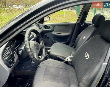 Черный Дэу Ланос, объемом двигателя 1.5 л и пробегом 160 тыс. км за 1800 $, фото 5 на Automoto.ua