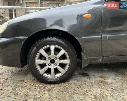 Чорний Деу Ланос, об'ємом двигуна 1.5 л та пробігом 222 тис. км за 1800 $, фото 12 на Automoto.ua