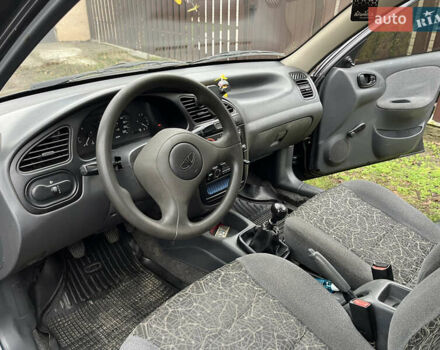 Черный Дэу Ланос, объемом двигателя 1.5 л и пробегом 140 тыс. км за 2500 $, фото 18 на Automoto.ua