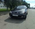 Черный Дэу Ланос, объемом двигателя 1.5 л и пробегом 202 тыс. км за 3250 $, фото 1 на Automoto.ua