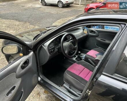Чорний Деу Ланос, об'ємом двигуна 1.5 л та пробігом 222 тис. км за 1800 $, фото 17 на Automoto.ua