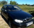 Чорний Деу Ланос, об'ємом двигуна 1.5 л та пробігом 300 тис. км за 3300 $, фото 1 на Automoto.ua