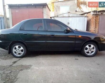 Черный Дэу Ланос, объемом двигателя 1.5 л и пробегом 231 тыс. км за 1999 $, фото 3 на Automoto.ua