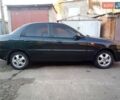 Черный Дэу Ланос, объемом двигателя 1.5 л и пробегом 231 тыс. км за 1999 $, фото 3 на Automoto.ua