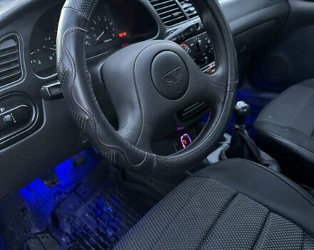 Черный Дэу Ланос, объемом двигателя 1.5 л и пробегом 270 тыс. км за 1900 $, фото 10 на Automoto.ua