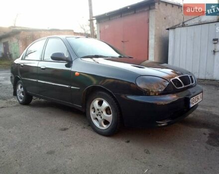 Черный Дэу Ланос, объемом двигателя 1.5 л и пробегом 231 тыс. км за 1999 $, фото 1 на Automoto.ua