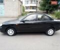 Черный Дэу Ланос, объемом двигателя 1.5 л и пробегом 200 тыс. км за 1999 $, фото 5 на Automoto.ua