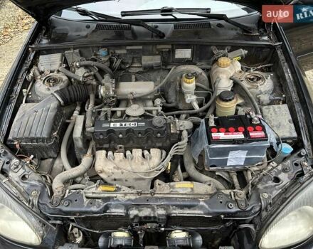 Чорний Деу Ланос, об'ємом двигуна 1.5 л та пробігом 222 тис. км за 1800 $, фото 21 на Automoto.ua