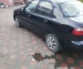 Черный Дэу Ланос, объемом двигателя 1.5 л и пробегом 266 тыс. км за 2000 $, фото 2 на Automoto.ua